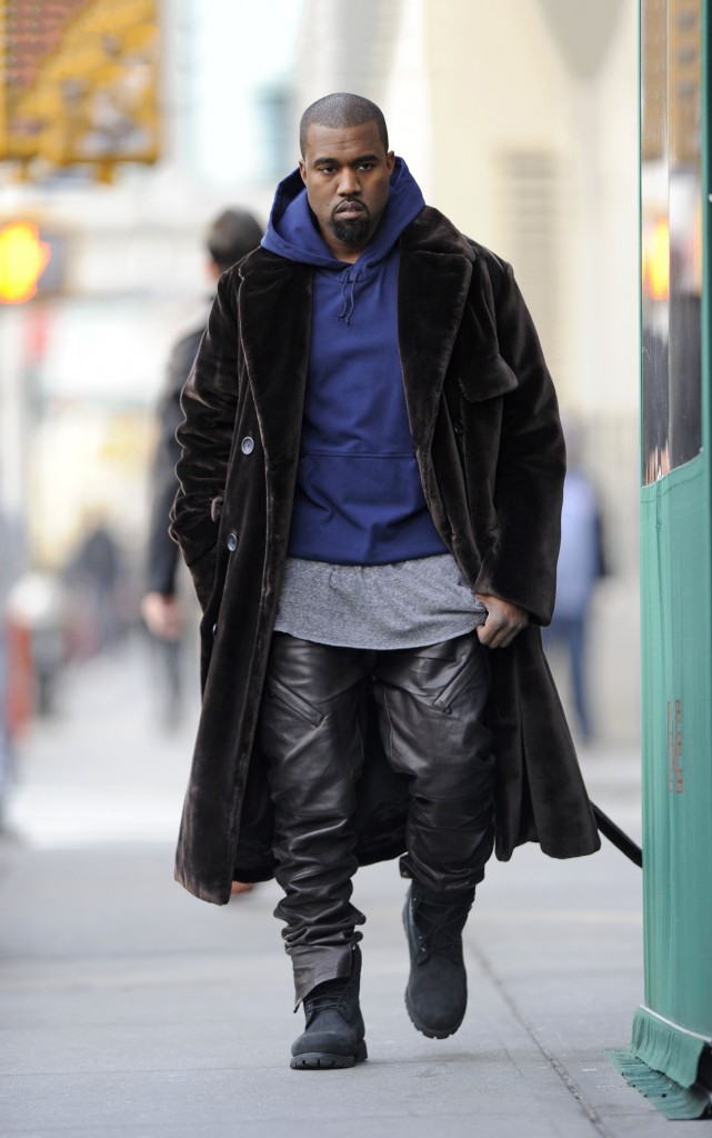 Kanye West talks on his cellphone in SOHO, New York City