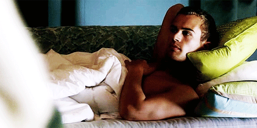 Theo-James-shirtless-in-bed-2