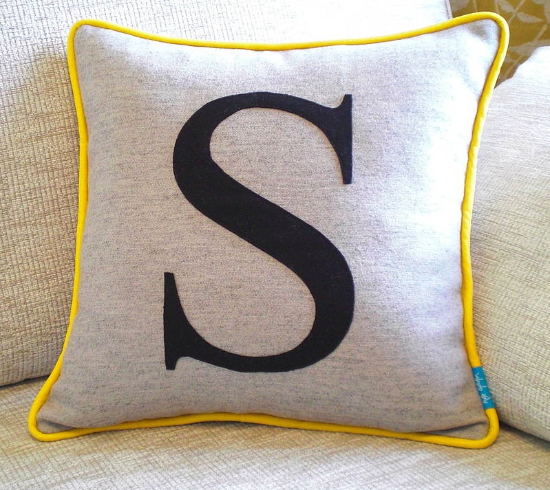 Initial cushion not on the high street