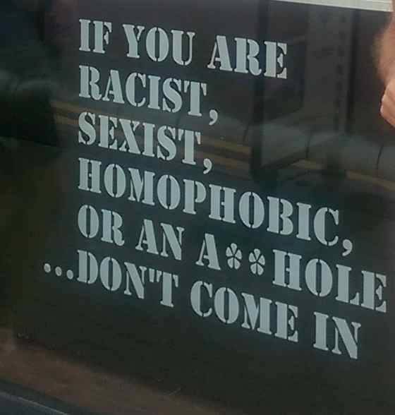 Prestatyn hairdressers where a customer refused to let a gay stylist cut his son's hair. Close-up of the sign
