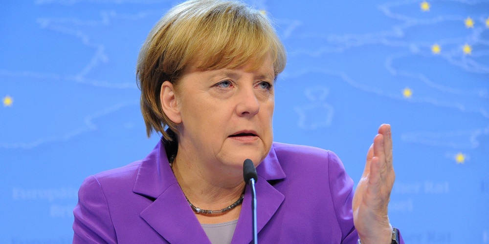 BRUSSELS, BELGIUM  OCTOBER 25 :  German Chancellor Angela Merkel speaks during a press conference after attending the European Council meeting on October 25, 2013 in Brussels, Belgium. (Photo by Dursun Aydemir/Anadolu Agency/Getty Images)