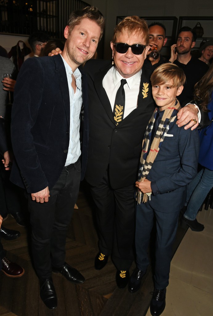 LONDON, ENGLAND - NOVEMBER 03: (L to R) Christopher Bailey, Sir Elton John and Romeo Beckham attend the Burberry Festive film premiere at 121 Regent Street on November 3, 2015 in London, England. (Photo by David M. Benett/Dave Benett/Getty Images for Burberry) *** Local Caption *** Christopher Bailey;Elton John;Romeo Beckham