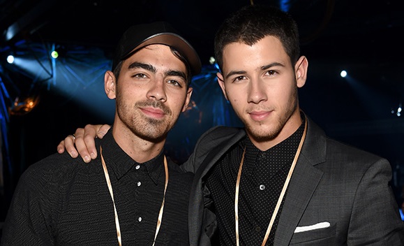NEW YORK, NY - SEPTEMBER 16: Joe Jonas (L) and Nick Jonas attend Nick Jonas' birthday celebration at Queen of The Night at The Paramount Hotel on September 16, 2014 in New York City. (Photo by Jamie McCarthy/Getty Images for Queen of the Night)