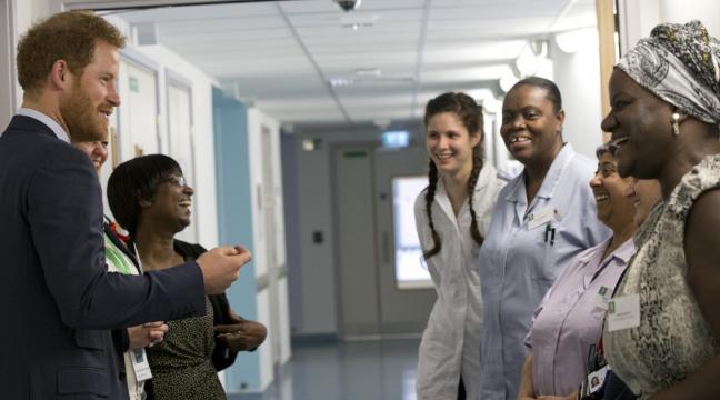 Prince Harry Visiting a HIV Hospital that was supported by his mother Diana.