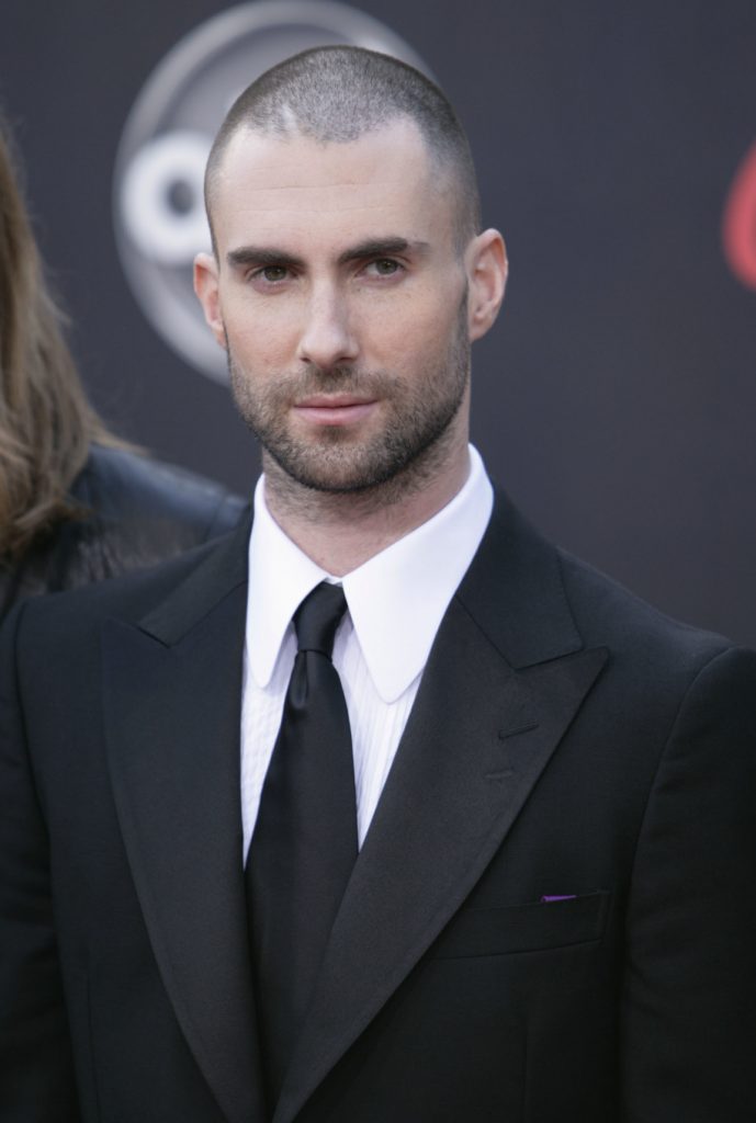 Adam Levine, of the band Maroon 5, arrives at the American Music Awards in Los Angeles on Sunday, Nov. 18, 2007. (AP Photo/Matt Sayles) ORG XMIT: CATS113