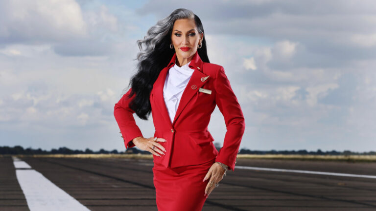 Michelle Visage models the iconic Virgin Atlantic uniforms to celebrate the change in the brand’s gender identity policy, which champions individuality