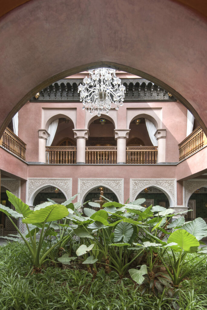 Palm-filled courtyard within La Sultana