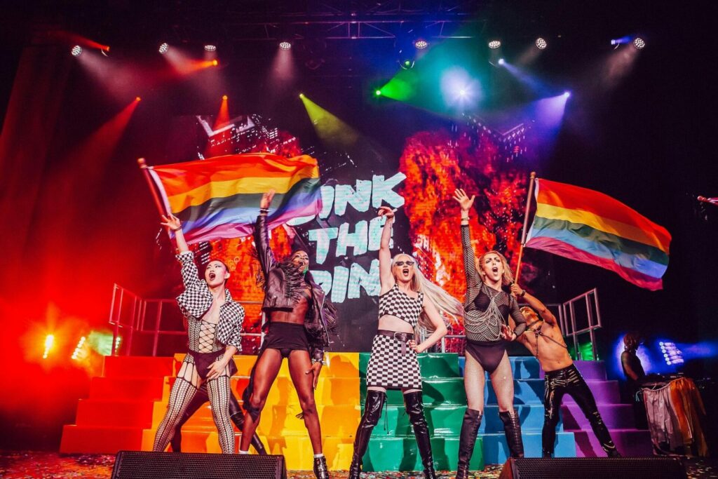 The club flies the rainbow flag for a Pride celebration