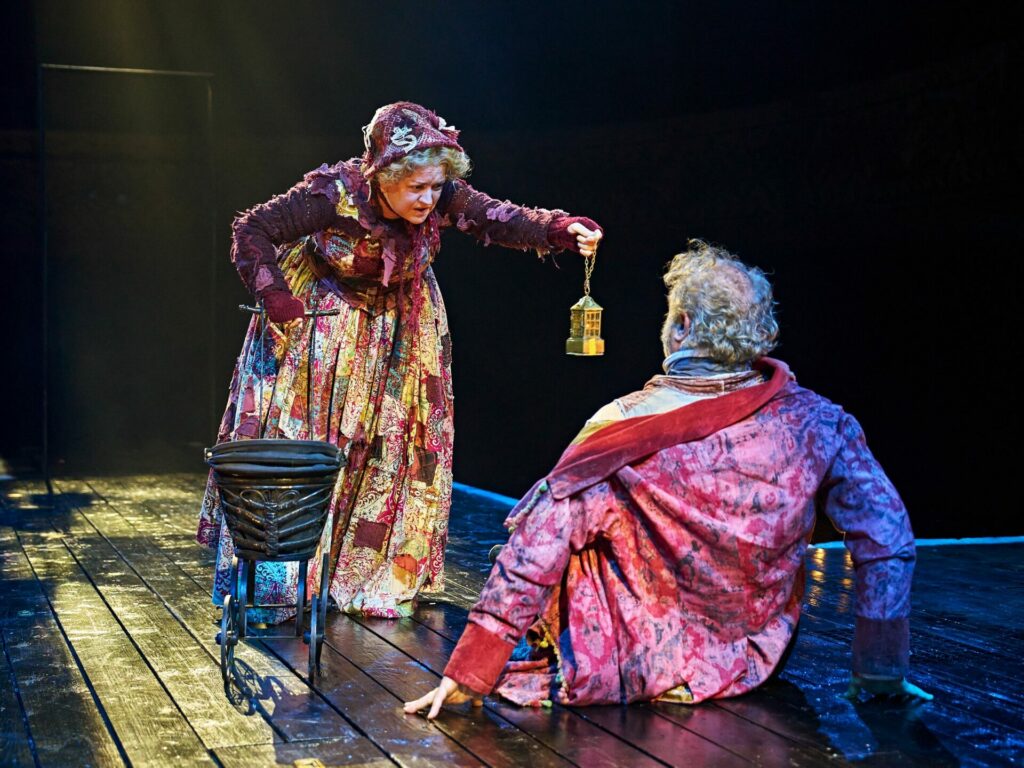 Julie Jupp as Ghost of Christmas Past and Owen Teale as Scrooge in A Christmas Carol