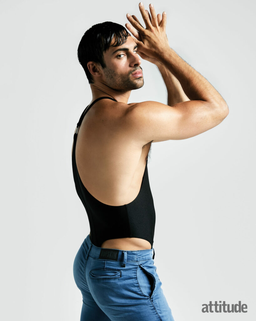 Elliot wears Omar Onyx bodysuit and Floyd jeans, both by Rufskin.