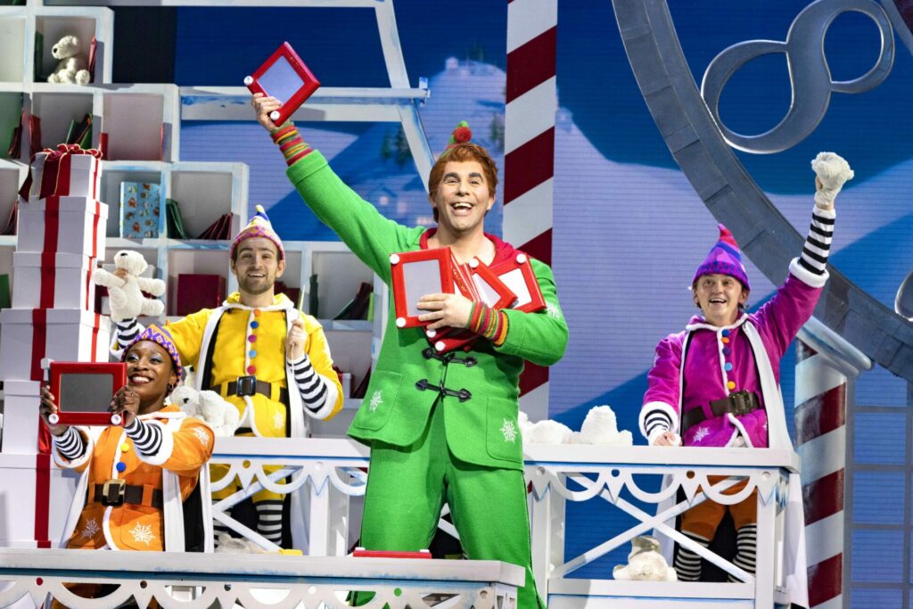 Simon Lipkin and cast in Elf