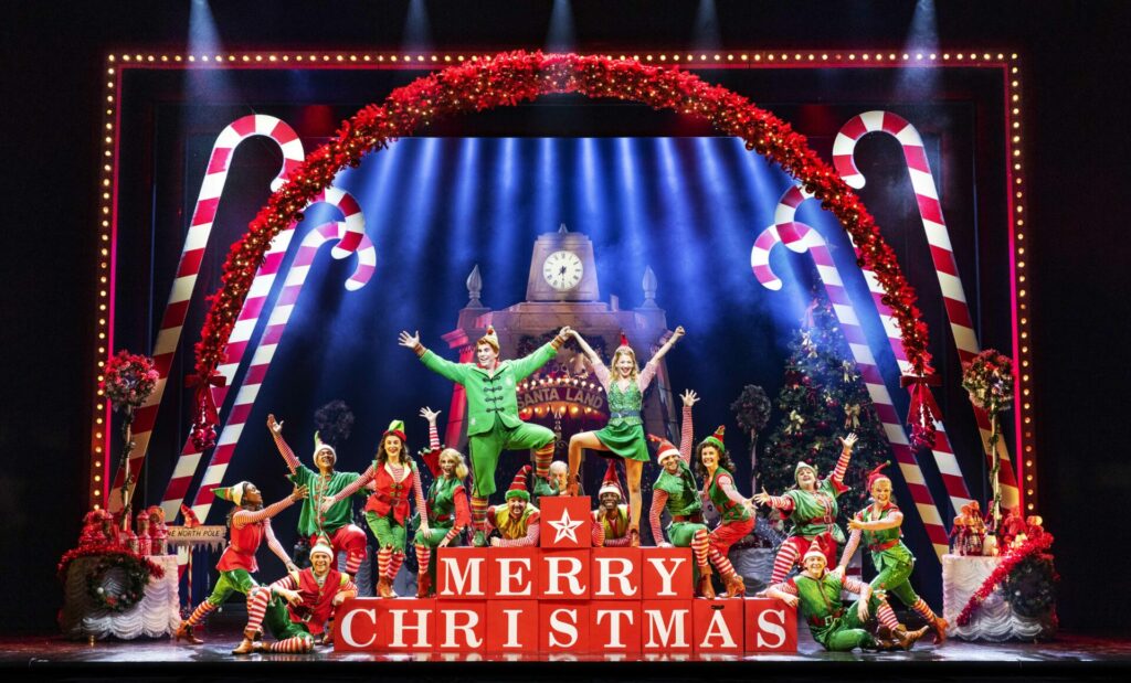 Simon Lipkin and cast in Elf