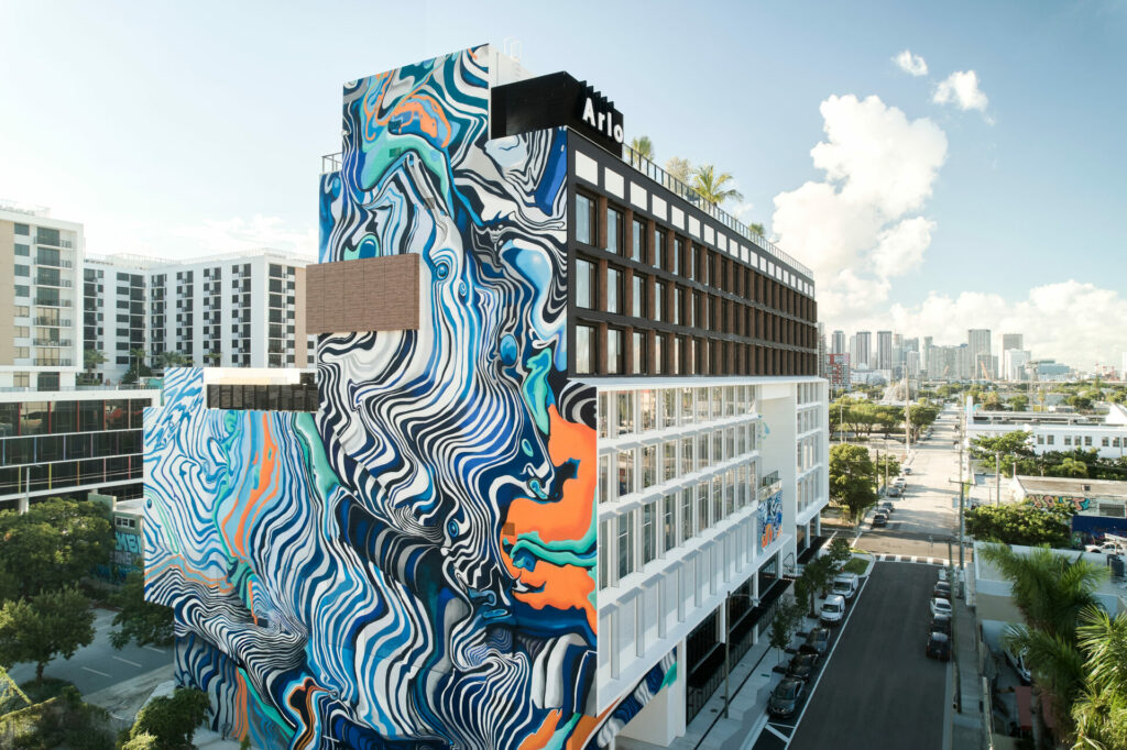 Hoxxoh's 14,000-square-foot mural on the side of the Arlo Wynwood in Miami