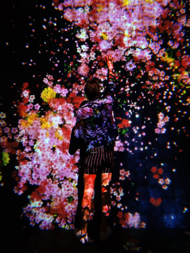 Alastair James explores teamLab's floral art at Superblue, Miami