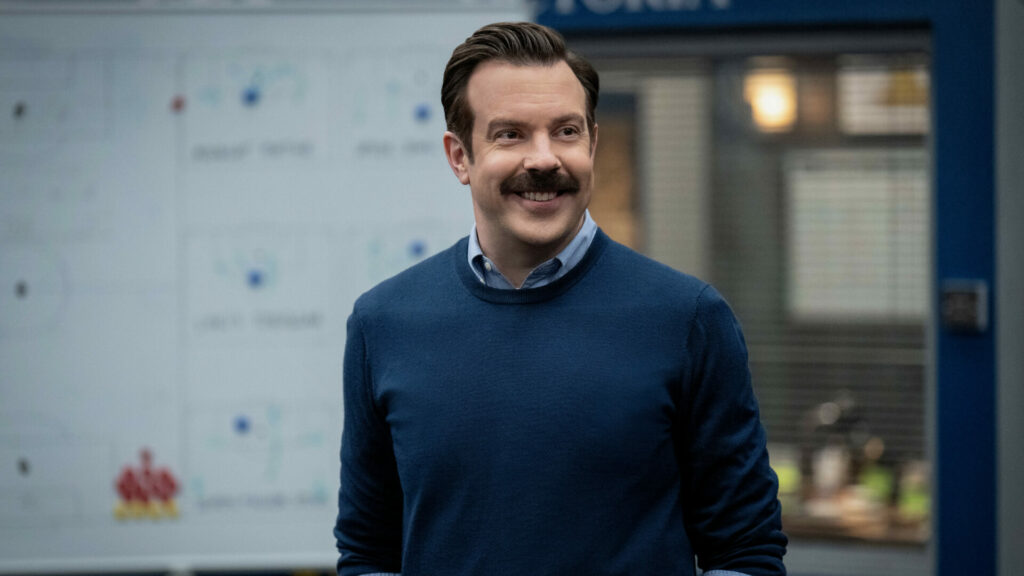 Jason Sudeikis as Coach Ted Lasso in Ted Lasso