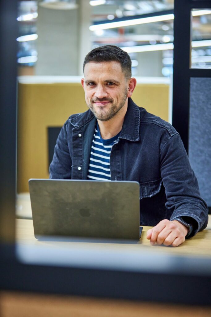 Lewis Bell tells myGwork that working at Booking.com is "the best move I’ve made in my career"