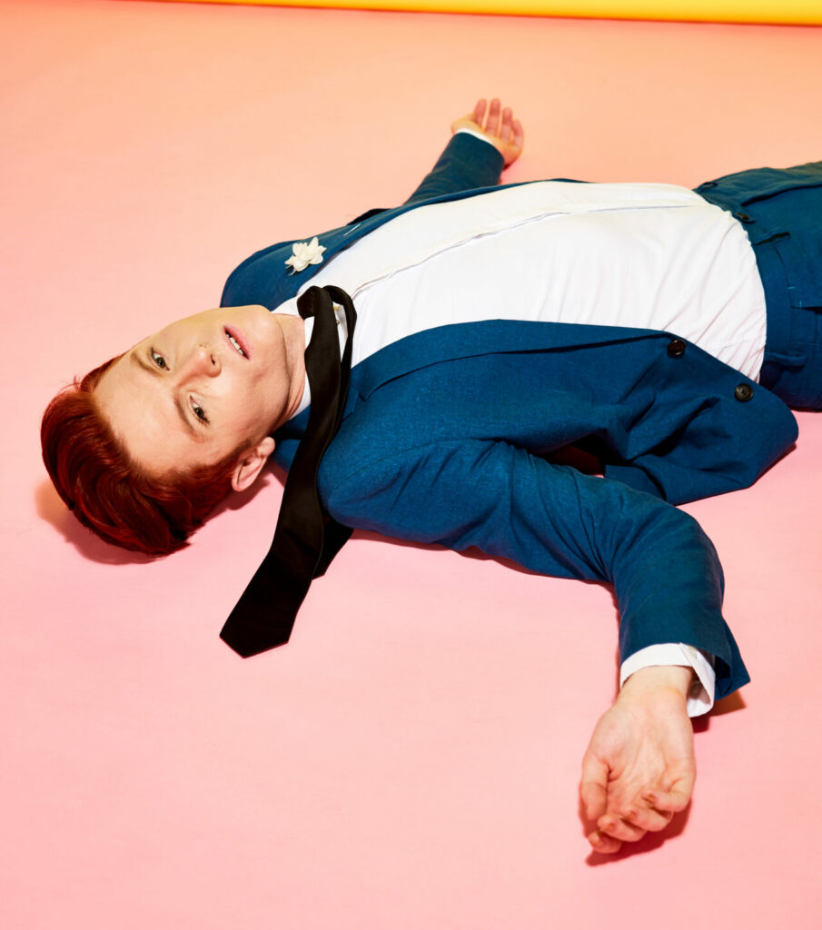 Rhys Nicholson lying down on the floor