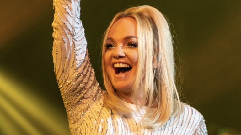 Emma Bunton smiling on stage.