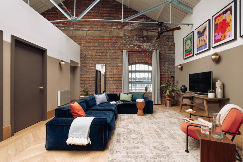 Red bricks and heavy set girders mix with more modern furniture and frosted hues at the Native Manchester