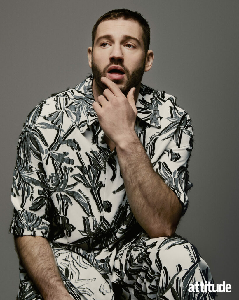 Alexander Lincoln in a matching black and white patterned outfit.