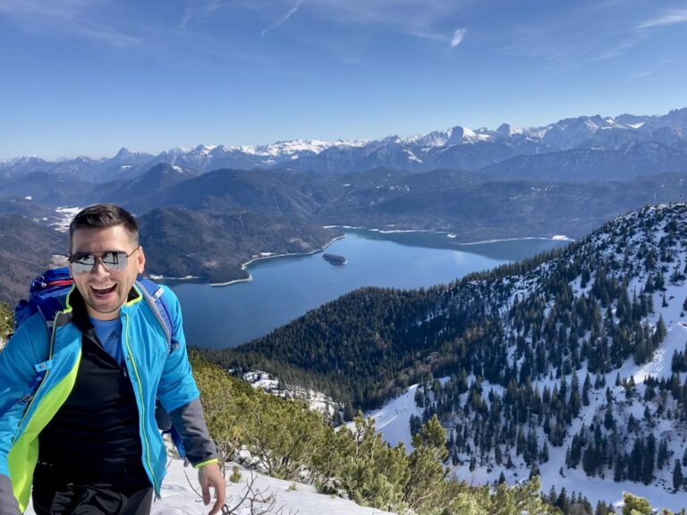 A man standing in front of a mountain