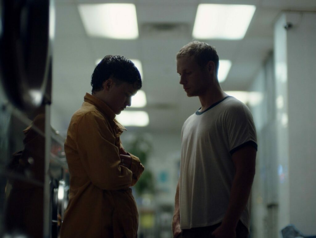 still of Mutt, two silhouetted characters in a gas station