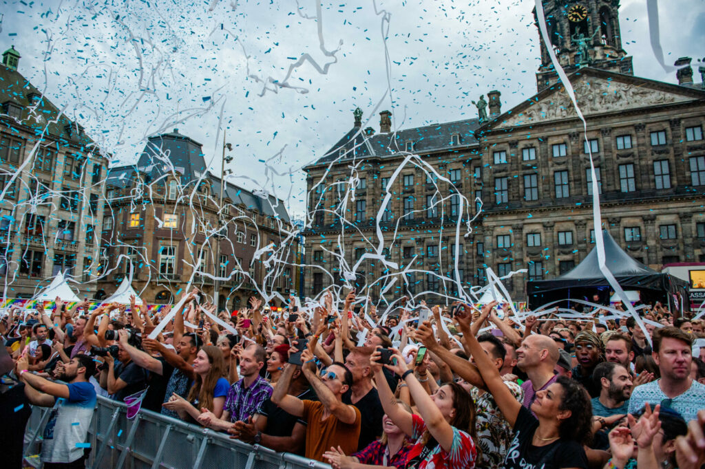 People are seen having fun while canons releases confetti during the performance of Netta. 2018 Eurovision Winner Representing Israel Netta, gave a performance during the final concert of the Pride Amsterdam at the Dam square, in the center of the city. 