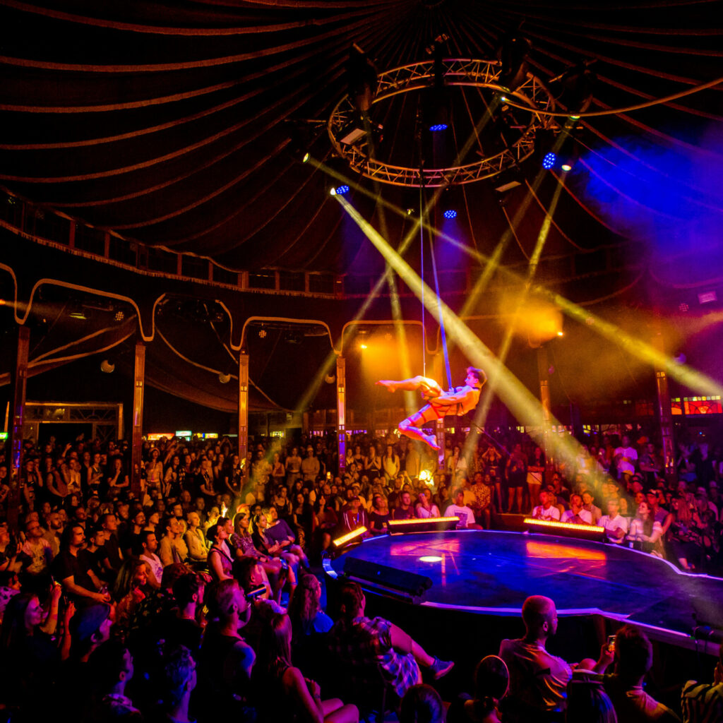 Performers ons stage at Sziget festival, an aerial circus act.