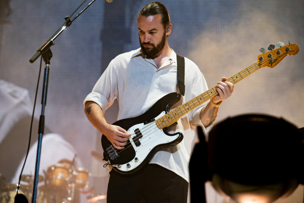 Ross MacDonald of the 1975 performing on stage