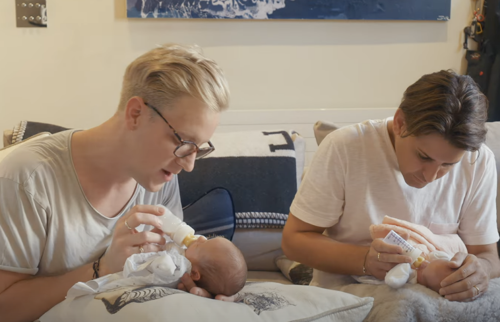 Gareth and Ollie Locke feeding their newborn twins