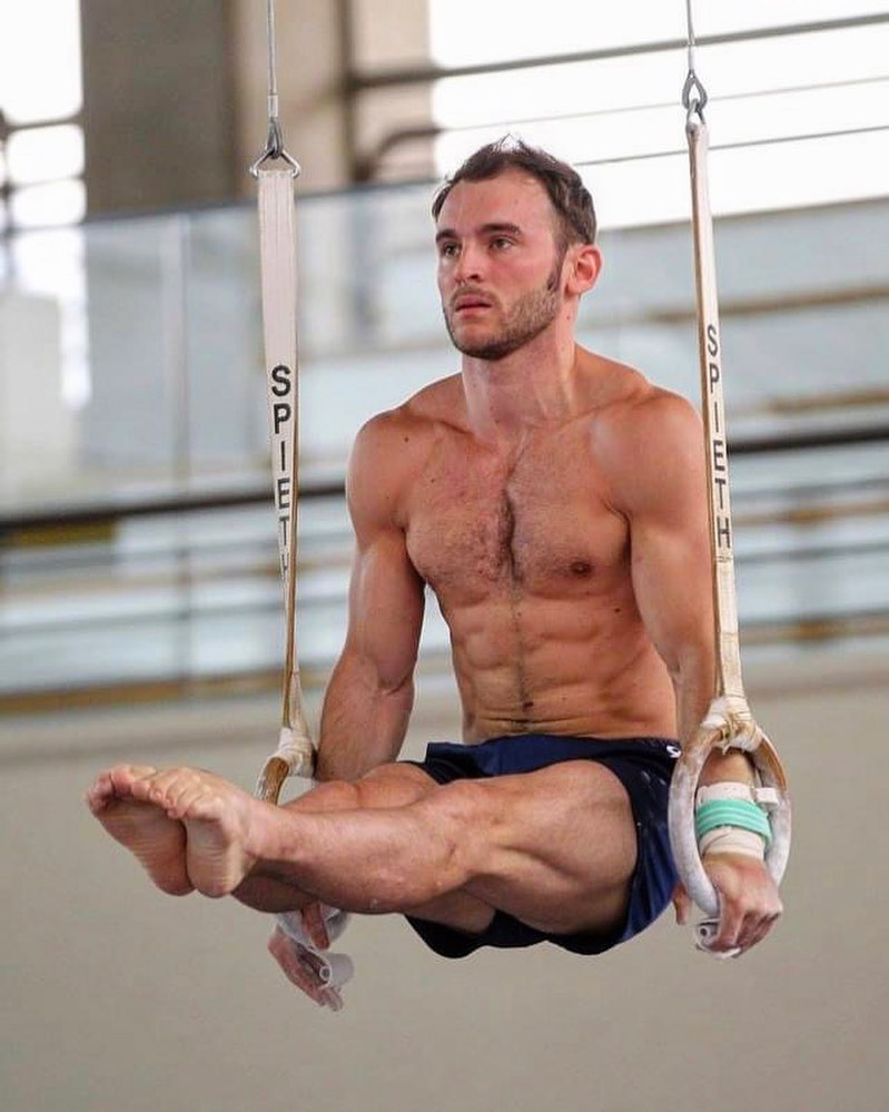 A man performs gymnastics