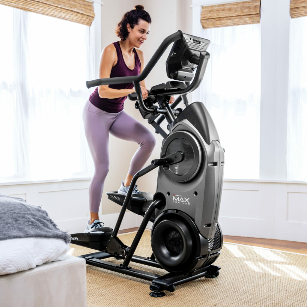 A person works out on a training machine