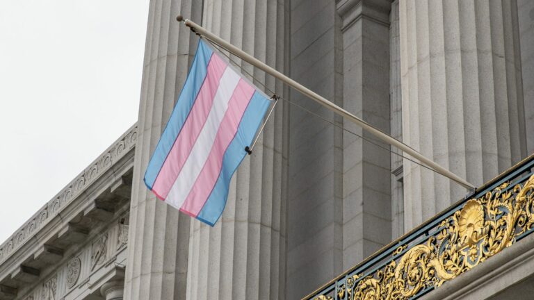 Transgender pride flag flies from the mayor's balcony outside San Francisco City Hall.