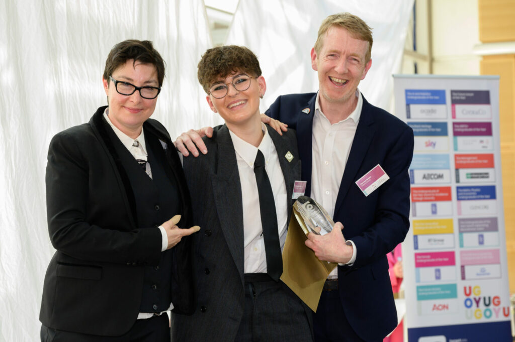 Three people in suits 