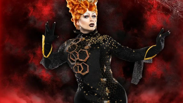 Stylised photo of a drag queen with orange hair dressed in a black outfit with beehive detailing