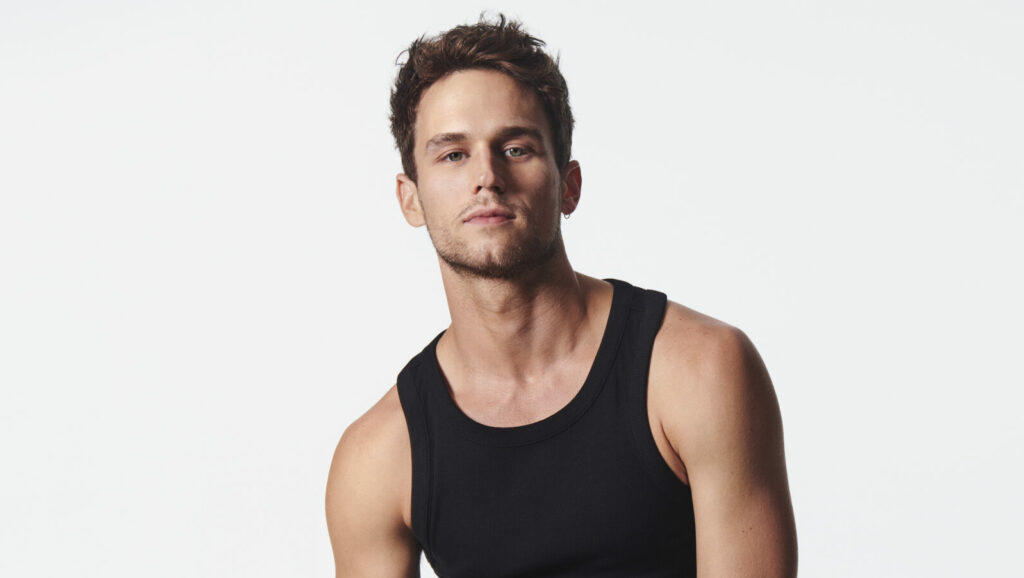 Brandon Flynn models the Calvin Klein Holiday 2023 campaign