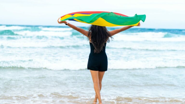 Woman walks with Mauritius flag