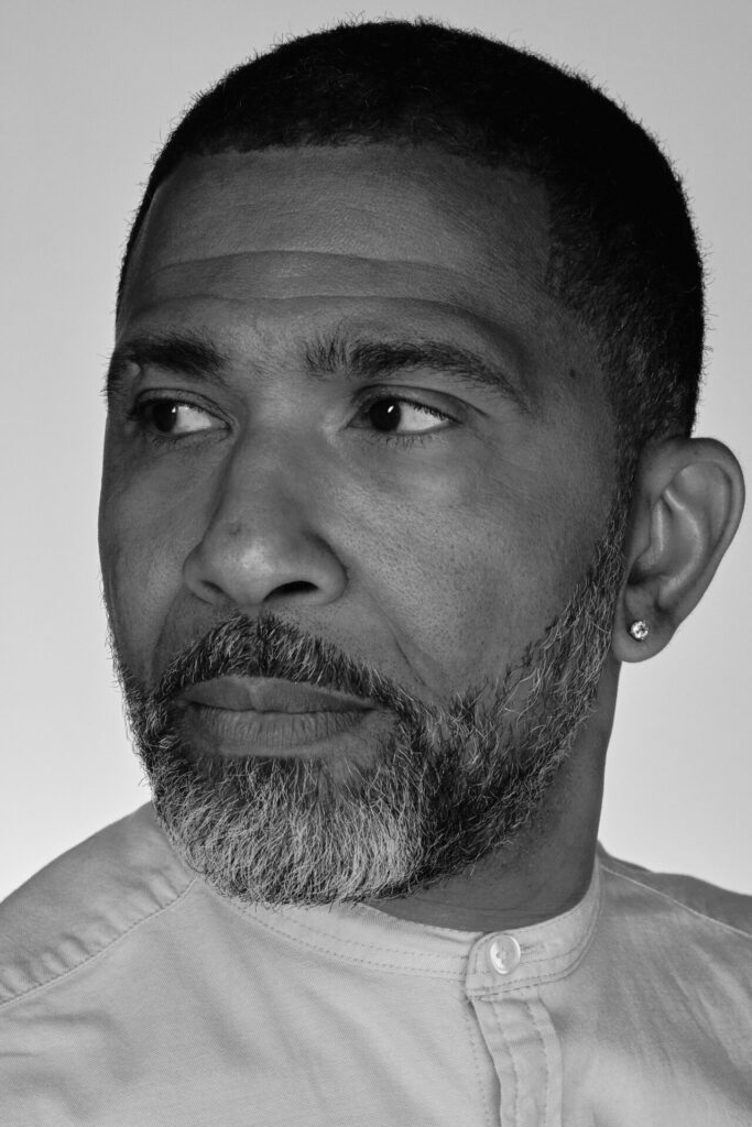 Black and white profile shot of a man looking to the side