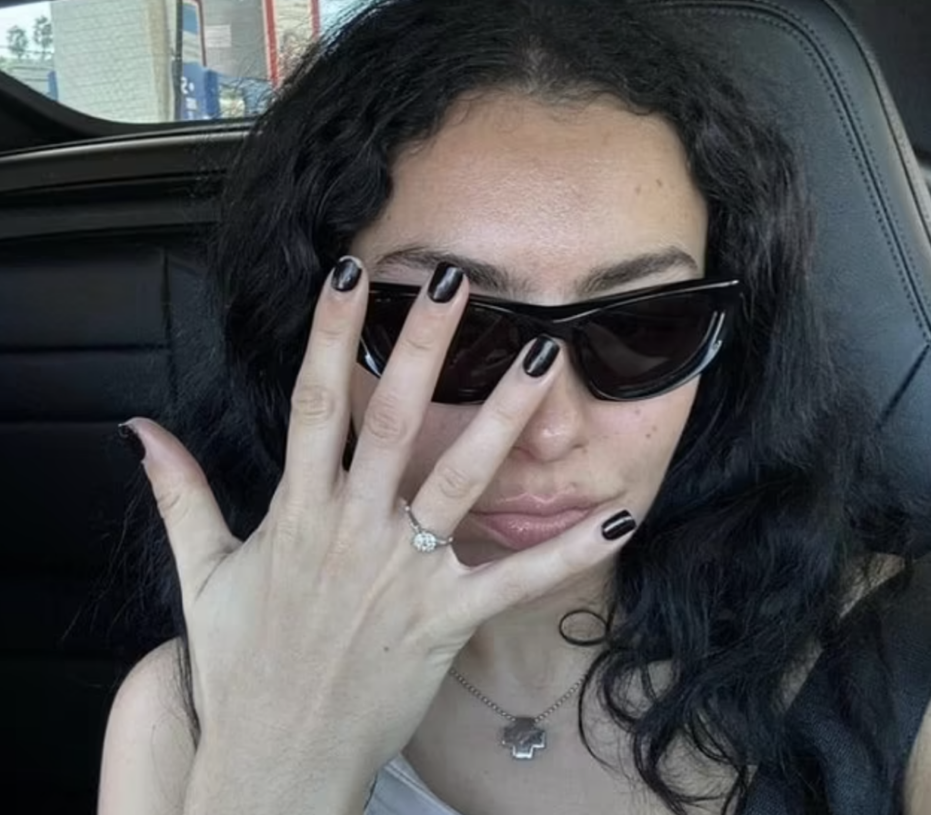 charli xcx flashes engagement ring