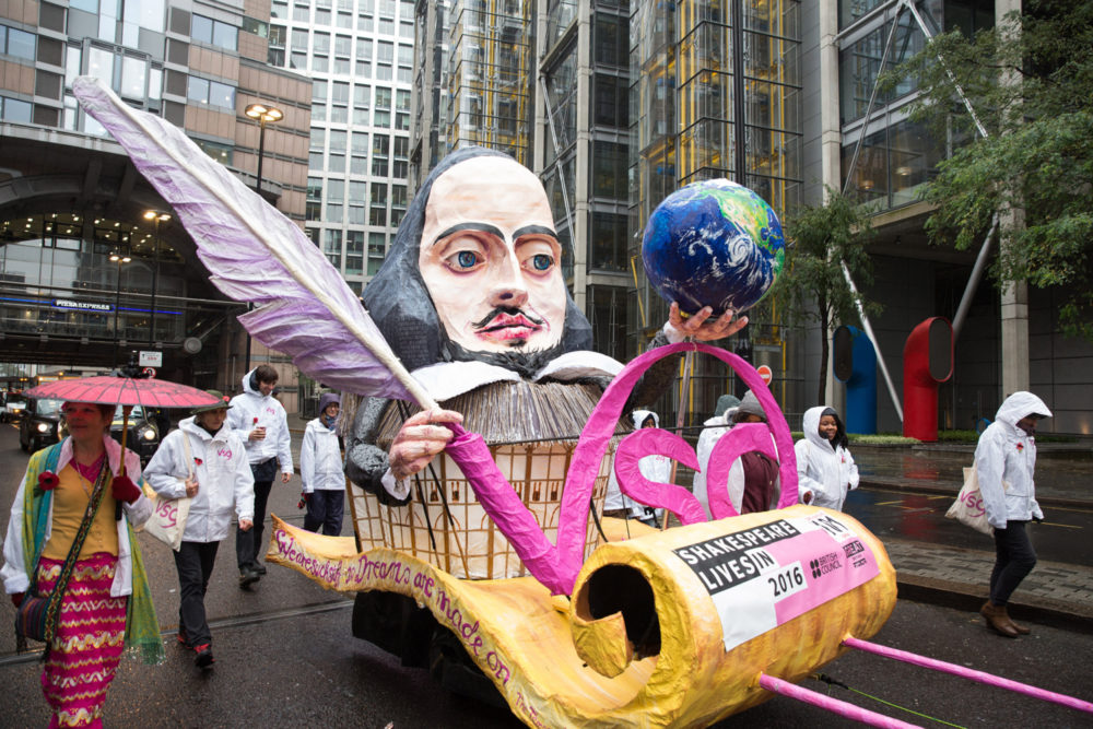 A Shakespear puppet in a float on a wet UK street
