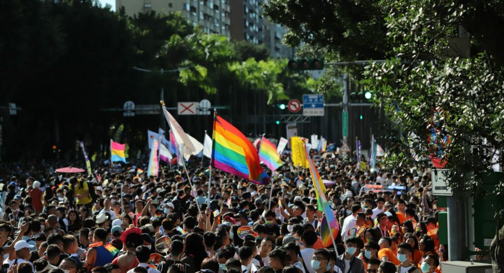Crowds of people on the streets of Taipei celebrating Pride