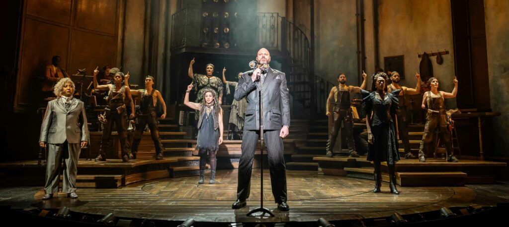 Hadestown cast peform onstage