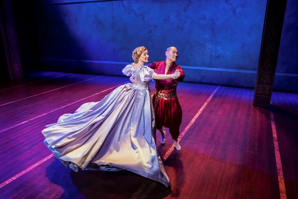 Helen George and Darren Lee dance onstage in The King and I