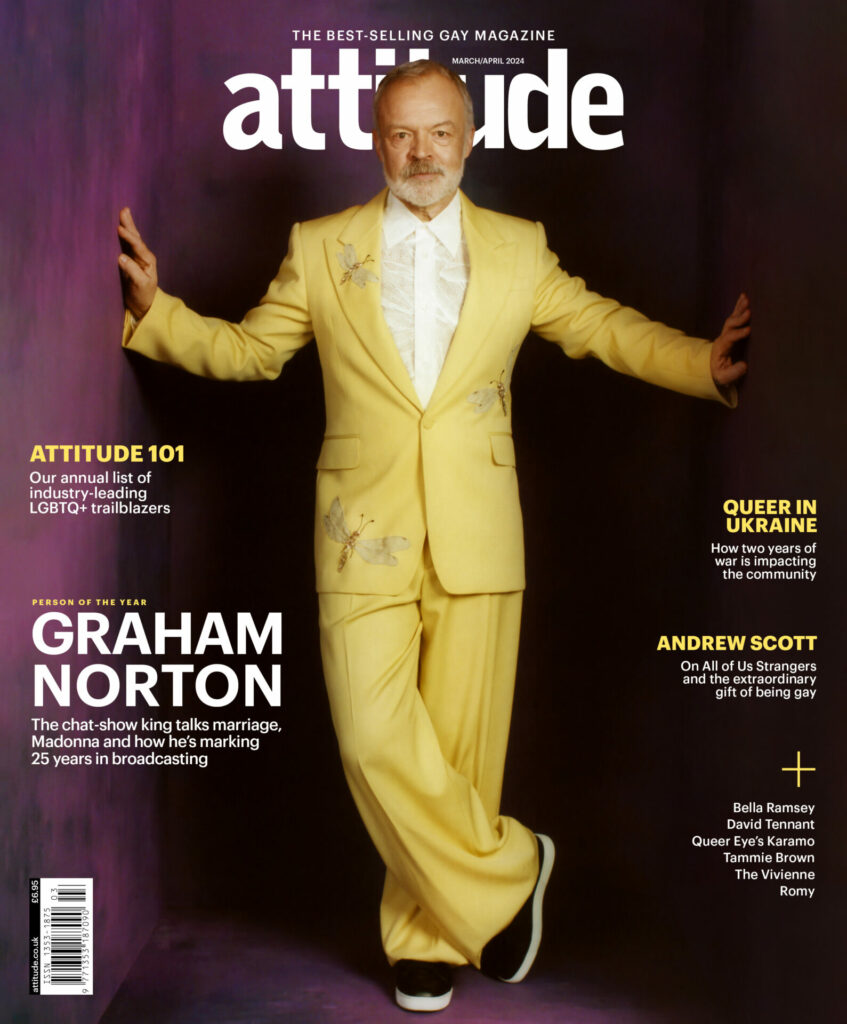 Graham on the cover of Attitude, wearing a yellow suit