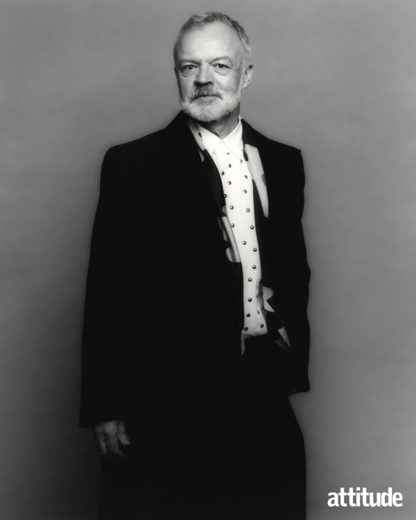 A black and shite portrait image of Graham in a black suit