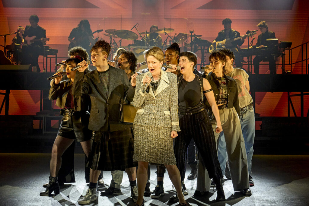 Julie Atherton (Margaret) and the Company in Just For One Day at The Old Vic