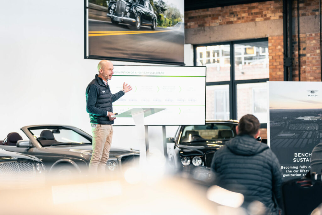 Wayne Bruce giving a talk on the Bentley campus