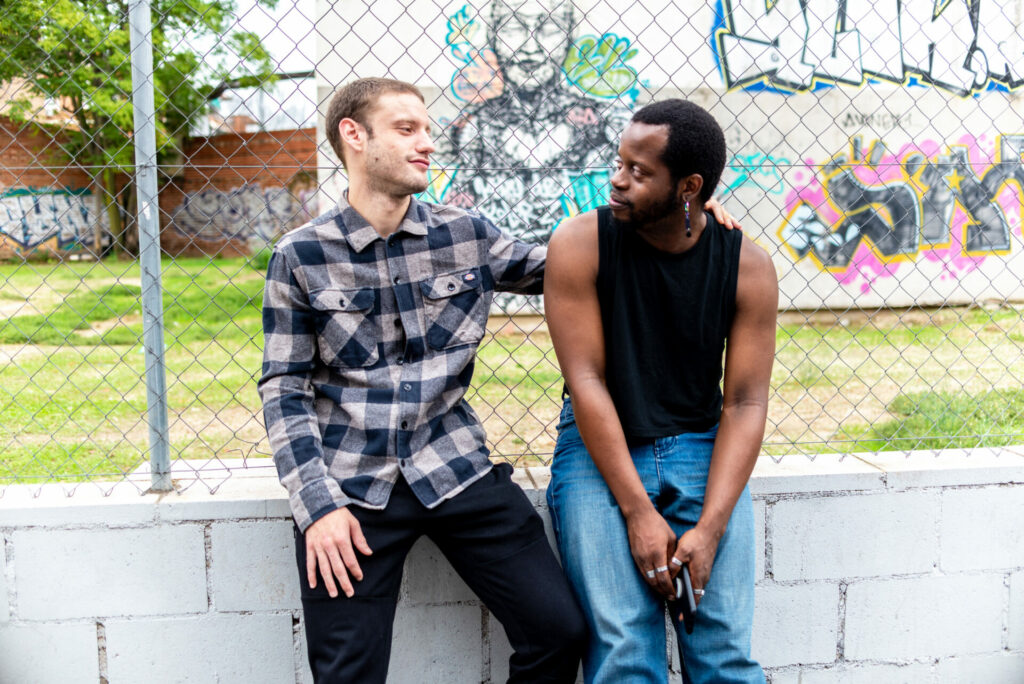 Juanmanuel E B and Alonso R L sitting before a fence (Image: Elska)