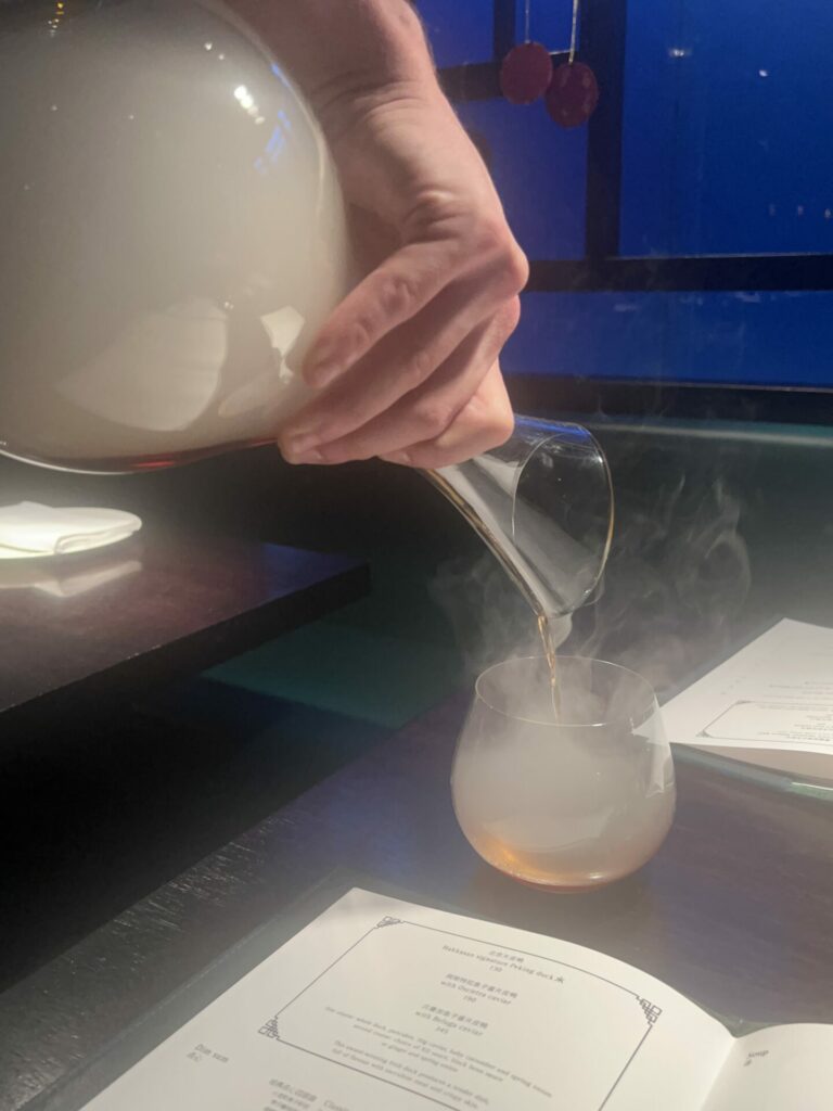 Smokey Negroni being poured
