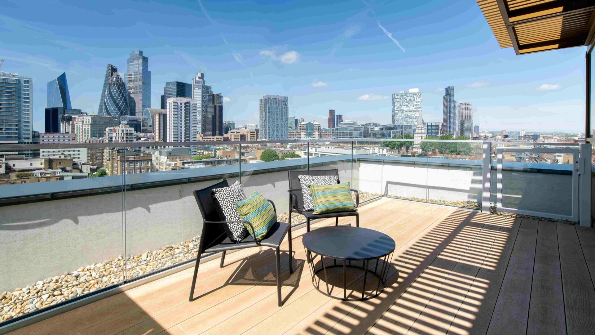 Hotel terrace with a view of the City of London skyline